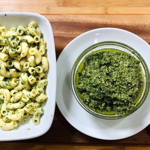 A bowl of vibrant green Basil Pesto Sauce